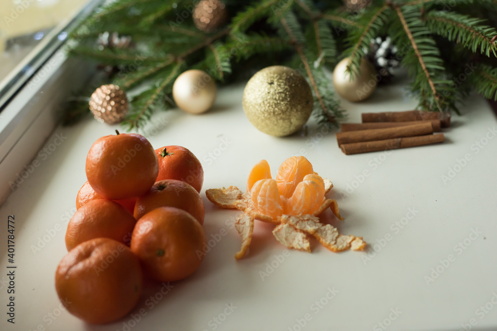 tangerines on a white background with a Christmas tree tangerines on a white background with a Christmas tree