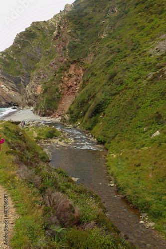 Heddon river flowing through the valley and over rocky ground