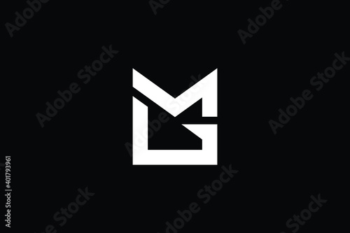MG logo letter design on luxury background. GM logo monogram initials letter concept. MG icon logo design. GM elegant and Professional letter icon design on black background. M G GM MG