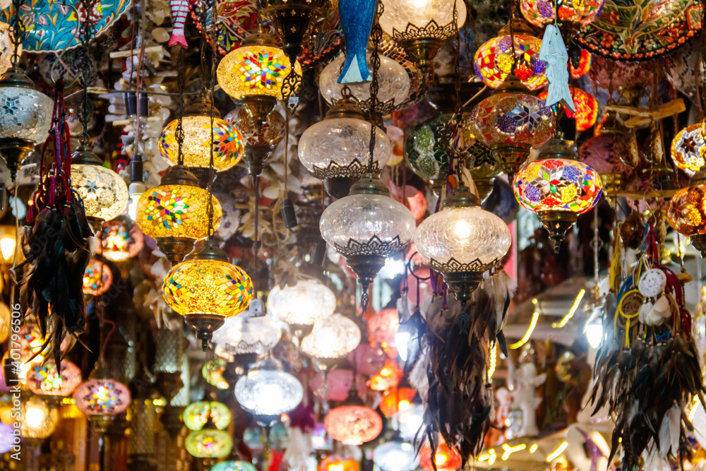 Turkish mosaic lamps or Moroccan lanterns at store. Shop of oriental souvenirs