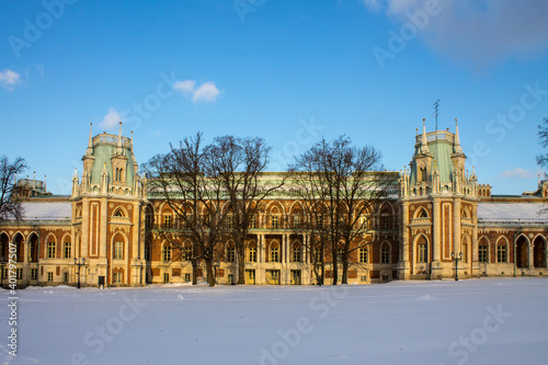 Large beautiful Palace in the Tsaritsyno Park-reserve on a snowy winter day against a blue sky and a space for copying in Moscow Russia