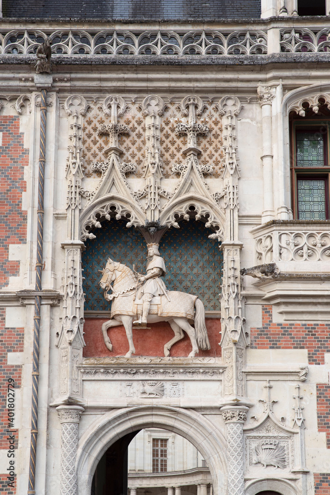 Statue of Francis I on the façade of the castle of Blois on the banks of the Loire in France