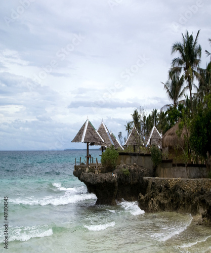 Beautiful view hut over the rock and the beach photo