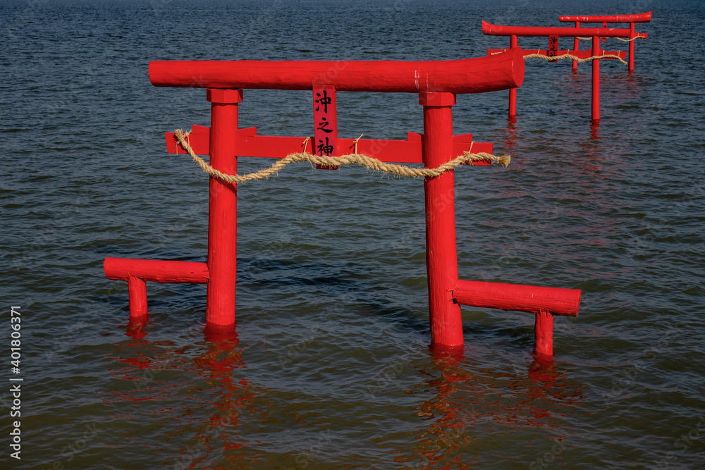 Red Shinto Shrines at the full tide Red Shinto Shrines at the full tide