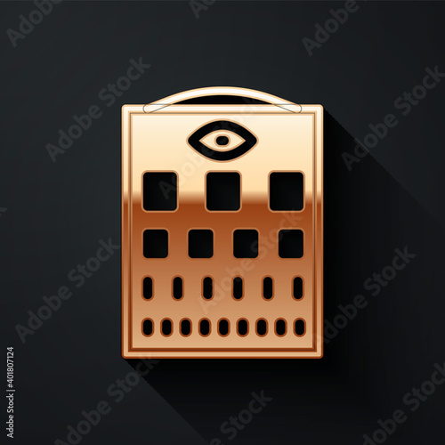 Gold Eye test chart icon isolated on black background. Poster for vision testing in ophthalmic study. Snellen chart. Long shadow style. Vector.