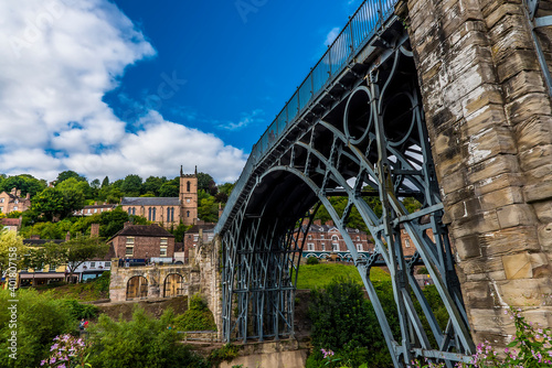 The town of Ironbridge, Shropshire. UK and the ancient bridge across the River Severn photo