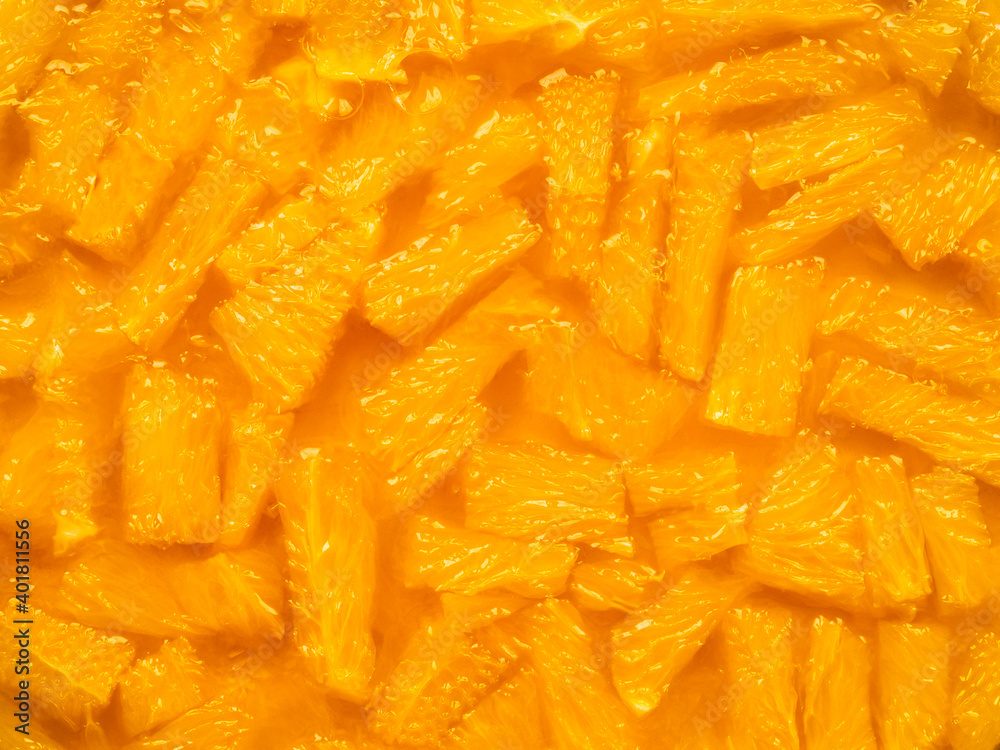 Flatlay. Top view of orange jelly dessert. Pieces of juicy oranges in a transparent fragrant edible gel. Minimalism in food. Bright food background. Copy space. Flatlay. Top view of orange jelly dessert. Pieces of juicy oranges in a transparent fragrant edible gel. Minimalism in food. Bright food background. Copy space.