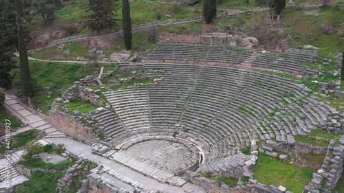 Drone video of iconic Temple of Athena Pronaia in archaeological site of Delphi, Voiotia, Greece
