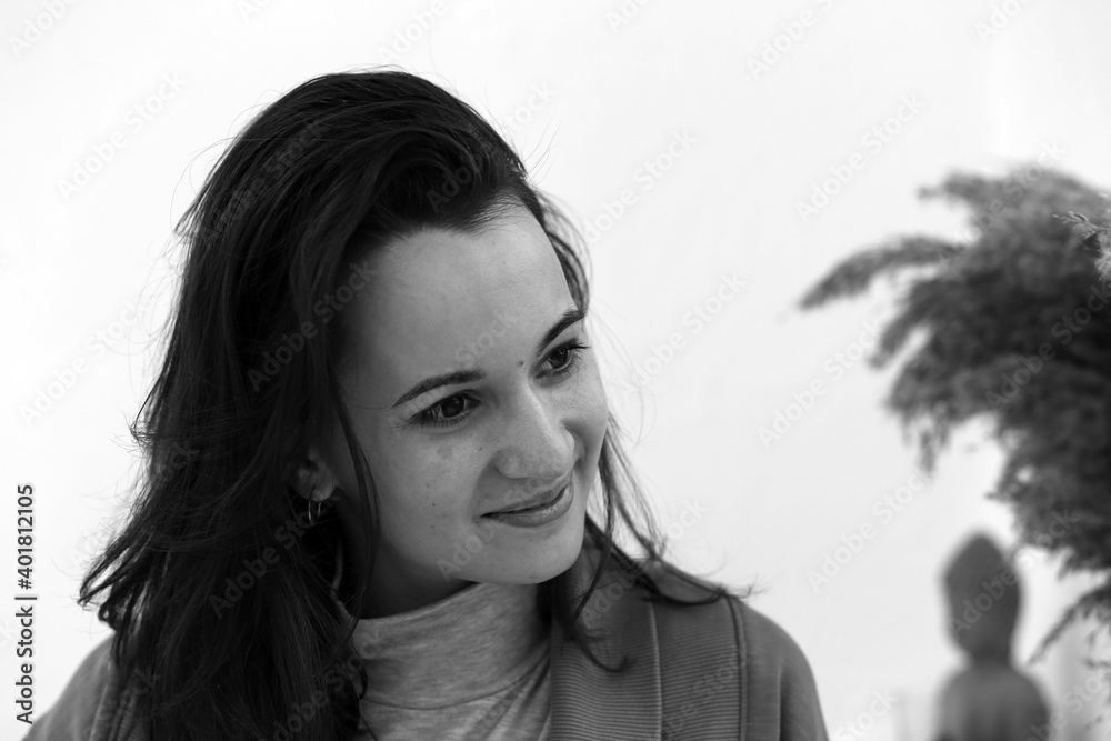 Obraz premium black and white portrait of a girl with dark hair
