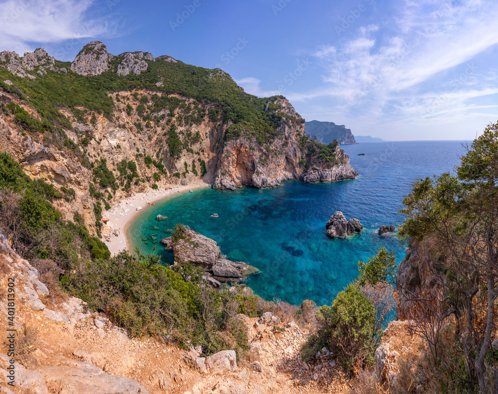 Beautiful summer seascape of the lonely Gyali Beach in Corfu Island, Greece, Europe and the Ionian Sea in the background