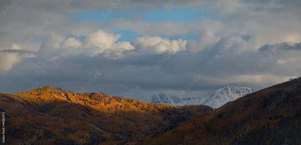 Russia. South Of Western Siberia, Mountain Altai. Autumn sunset in the North-Chuyskiy mountain range in the heart of the Kurai steppe.