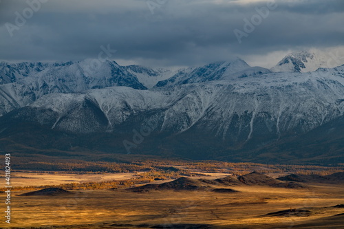 Russia. South Of Western Siberia, Mountain Altai. Autumn sunset in the North-Chuyskiy mountain range in the heart of the Kurai steppe.