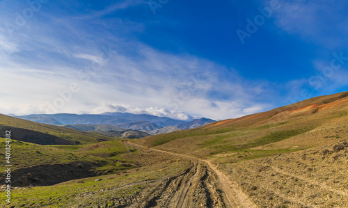 Difficult mountain road on a sunny day