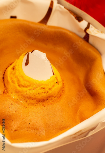 Homemade Sponge Cake (Pao de Lo) with Soft Eggs (Ovos Moles) cream, a traditional and very famous Portuguese dessert. photo
