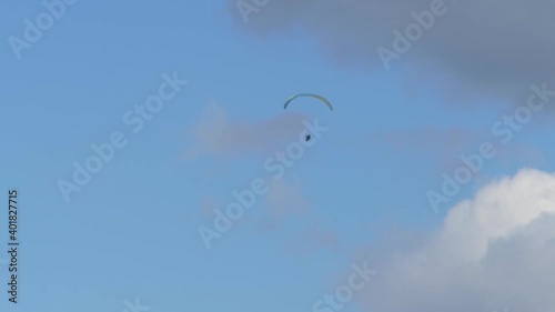 Paragliding Against Blue Sky In Summer - Rosins Lookout Conservation Park - Beechmont, Queensland, Australia. - low angle, static photo