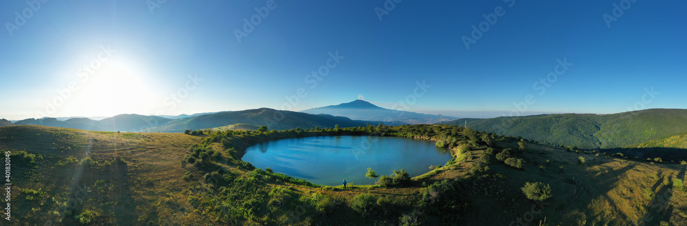 180 degree virtual reality panorama of the Nebrodi lakes valley with a view of the Etna volcano, Sicily, Italy. 180 degree virtual reality panorama of the Nebrodi lakes valley with a view of the Etna volcano, Sicily, Italy.
