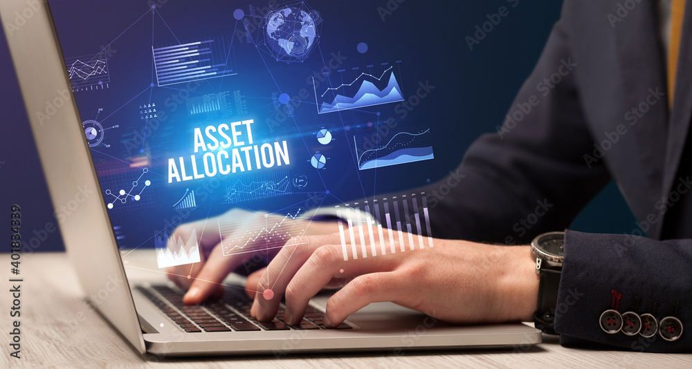 Businessman working on laptop with ASSET ALLOCATION inscription, new business concept