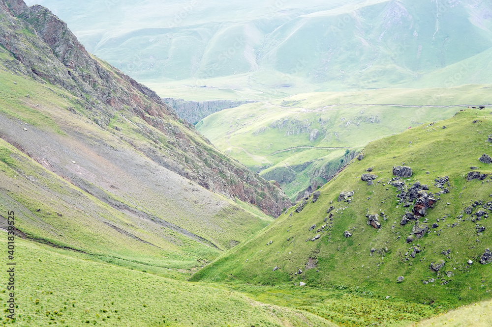 green valley in the mountains, Elbrus, Caucasus, Russia green valley in the mountains, Elbrus, Caucasus, Russia