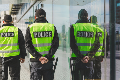 Two police officers on the daily patrol routine © Photographee.eu