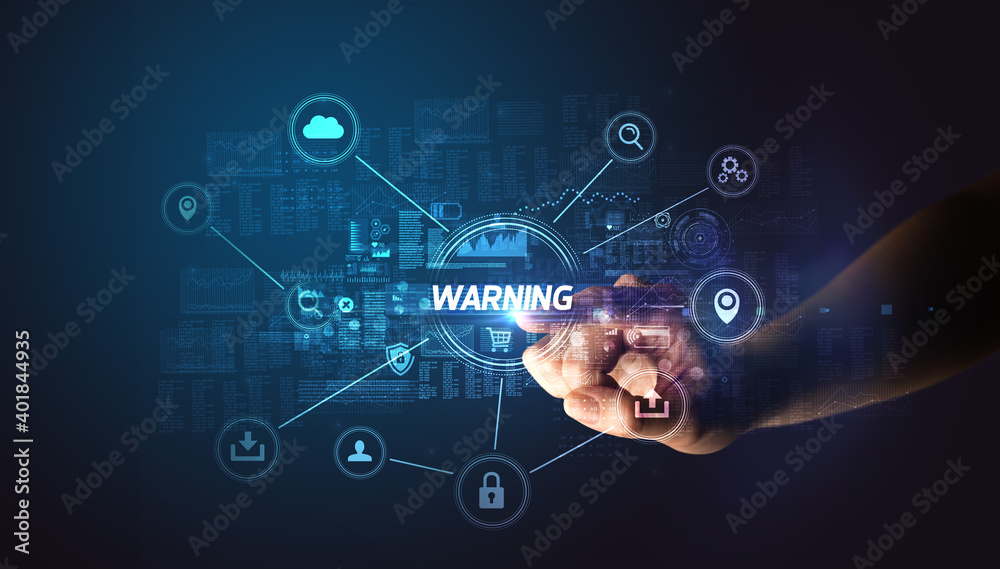 Hand touching WARNING inscription, Cybersecurity concept Hand touching WARNING inscription, Cybersecurity concept