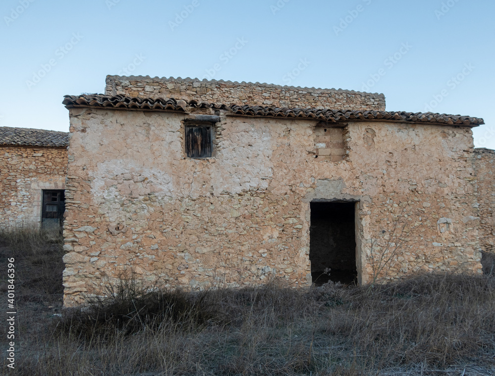 Abandoned farmhouses in the forest.