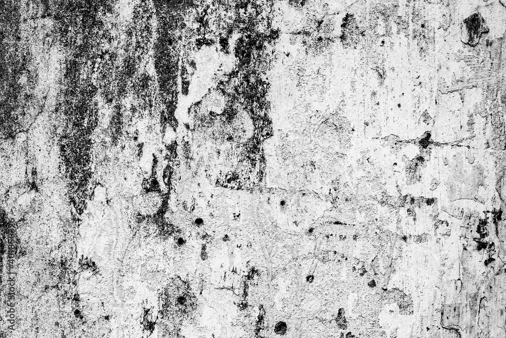 Fototapeta premium Texture of a concrete wall with cracks and scratches which can be used as a background