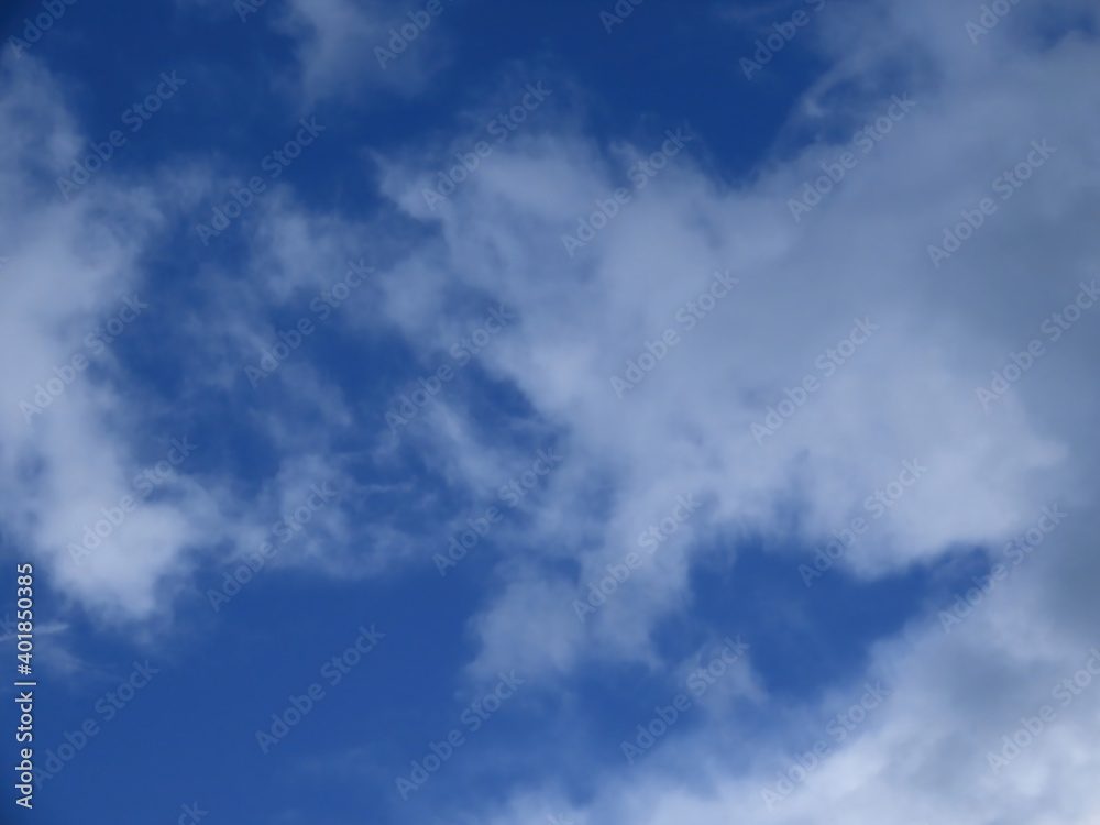 Beautiful white cloud against a blue sky in winter in Israel. Close-up nature.