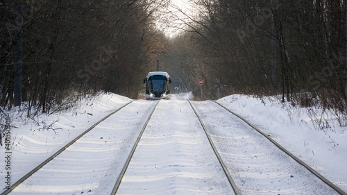 White tram in the Sokolniki winter park in Moscow