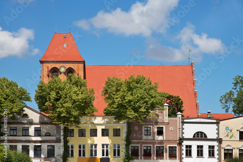 Market square and Parish church of St. Apostles Peter and Paul in Puck. Poland photo