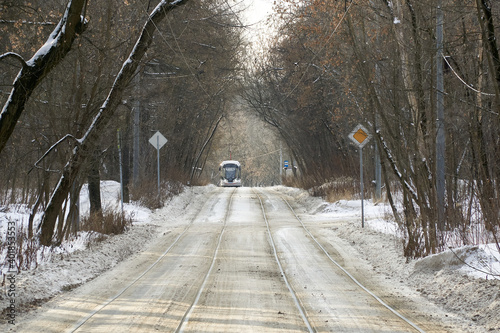 White tram in the Sokolniki winter park in Moscow