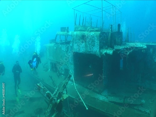 ship wreck scenery underwater shipwreck metal on the ocean floor with fish school around