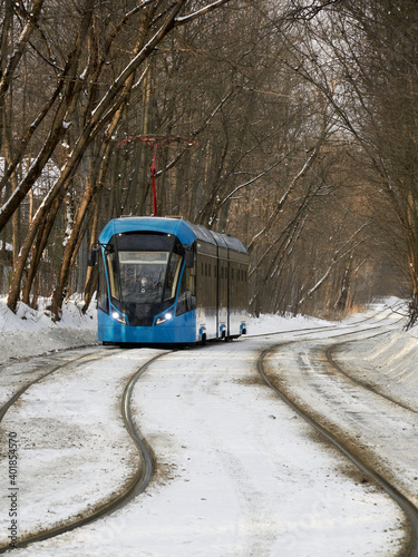 Blue tram in the Sokolniki winter park in Moscow © NCKAHDEP