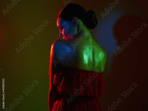 Beautiful Woman in Colorful bright lights