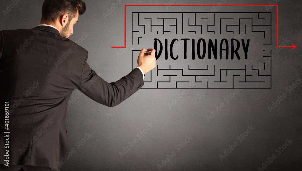 businessman drawing maze with DICTIONARY inscription, business education concept businessman drawing maze with DICTIONARY inscription, business education concept