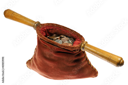 almsbag filled with US coins isolated on white background photo