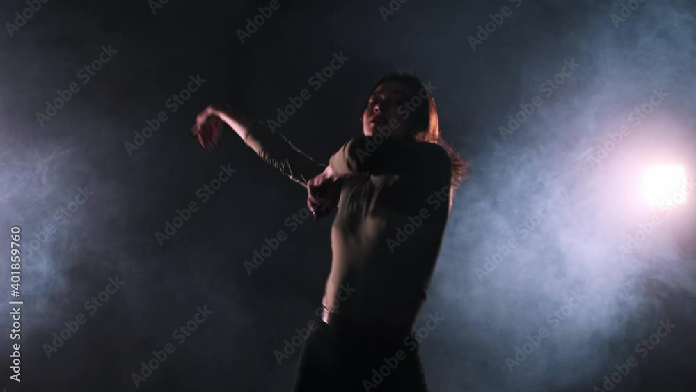 Vogue dancing in studio full of smoke - attractive woman sexy dancing Vogue dancing in studio full of smoke - attractive woman sexy dancing