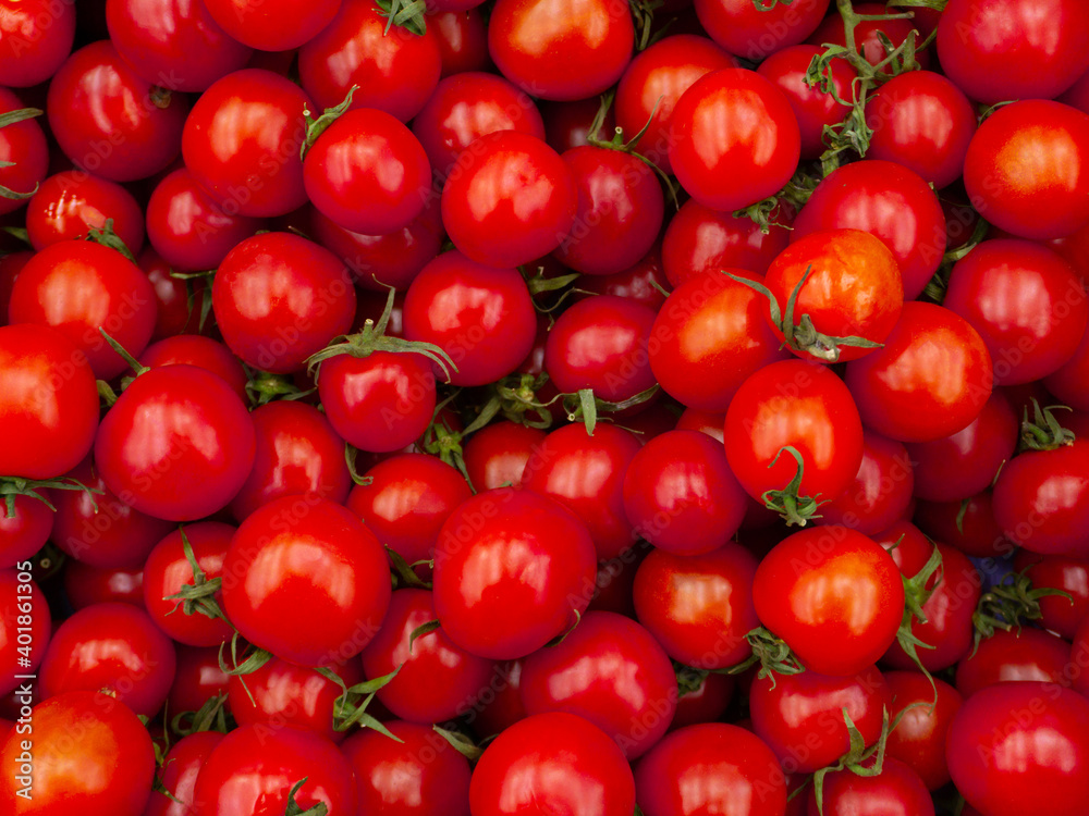 red tomatoes in the supermarket, on the counter red tomatoes in the supermarket, on the counter