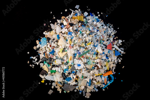 Stock photo of microplastics scattered on a black background photo