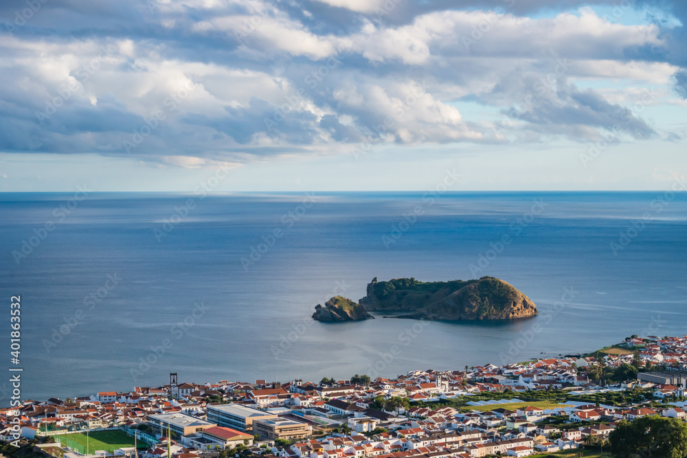 Aerial view to the historic center with roofs and church towers of Vila Franca do Campo and islet in the sea, São MIguel - Azores PORTUGAL
