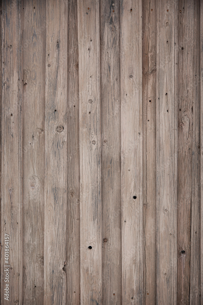 fragment of a fence made of old wooden boards with remnants of paint and nails, natural texture, background fragment of a fence made of old wooden boards with remnants of paint and nails, natural texture, background