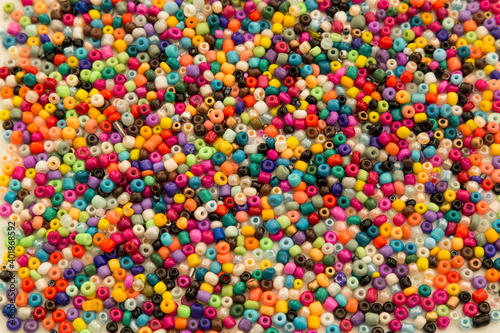 colorful beads and stones on the white background.