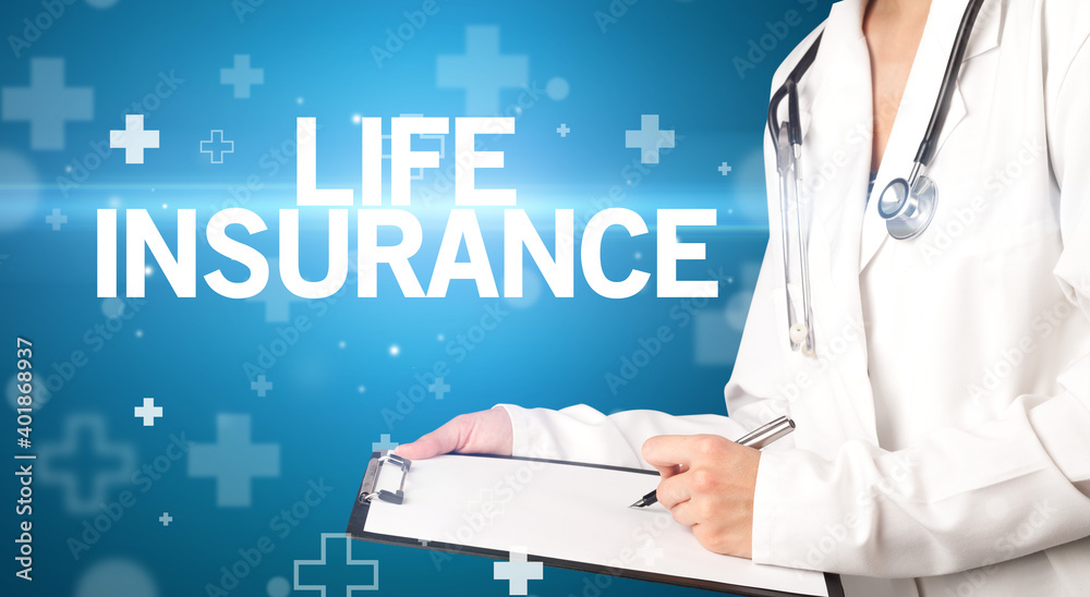 doctor writes notes on the clipboard with LIFE INSURANCE inscription, first aid concept doctor writes notes on the clipboard with LIFE INSURANCE inscription, first aid concept