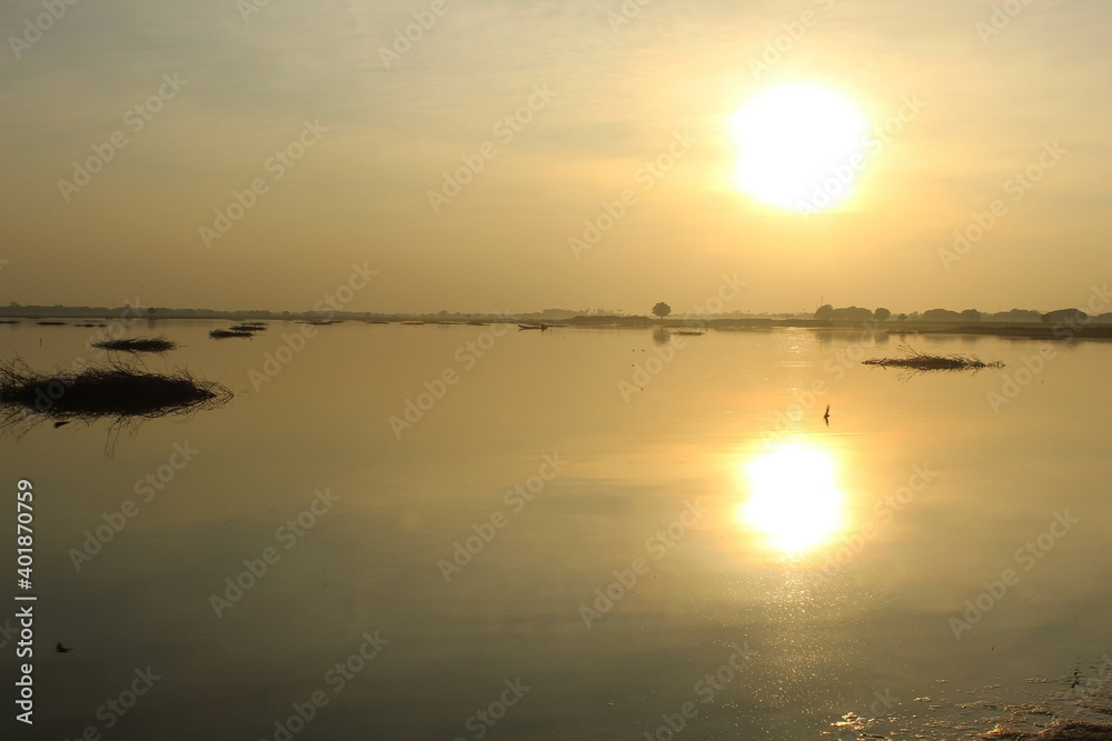 yellow sunset over the lake in Myanmar