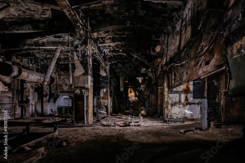 Burnt interior of industrial building or warehouse. Consequences of fire