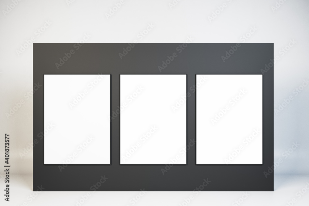 Spacious gallery room with three blank posters Spacious gallery room with three blank posters