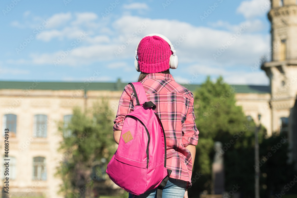 Adventure is out there. Little child carry travel bag outdoors. Vacation travel. Summer holidays Adventure is out there. Little child carry travel bag outdoors. Vacation travel. Summer holidays