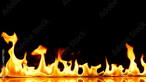 Fire Flames Igniting And Burning - Slow Motion. A line of real flames ignite on a black background. Real fire. Transparent background. 
Alpha Channel and Green Screen is included. PNG + Alpha.