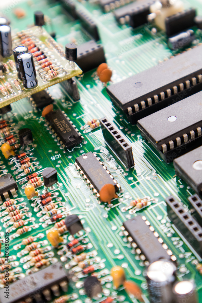 Obraz premium Macro close up of computer green pc motherboard microchip