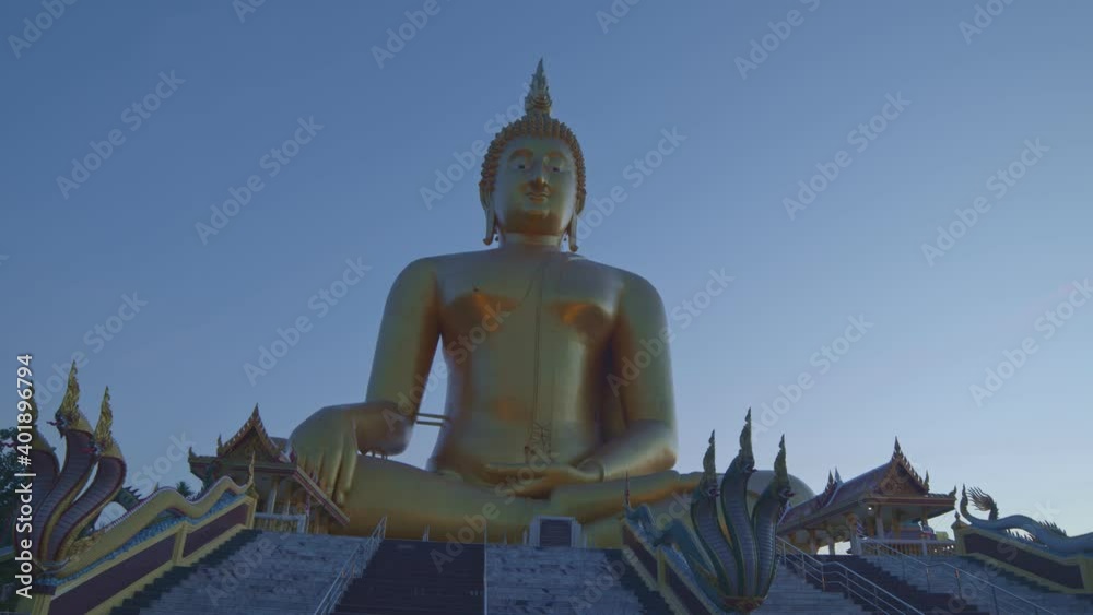 in front of the great Buddha of Thailand at wat Muang Ang Thong Thailand. .The largest Buddha statue in the world Can be seen from afar Surrounded in front of the great Buddha of Thailand at wat Muang Ang Thong Thailand. .The largest Buddha statue in the world Can be seen from afar Surrounded