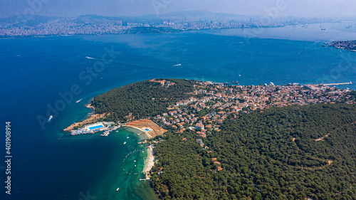 The magnificent view of Heybeli Island, surrounded by the Marmara Sea on all four sides, under the open sky, combines with the impressive view of the Boats.